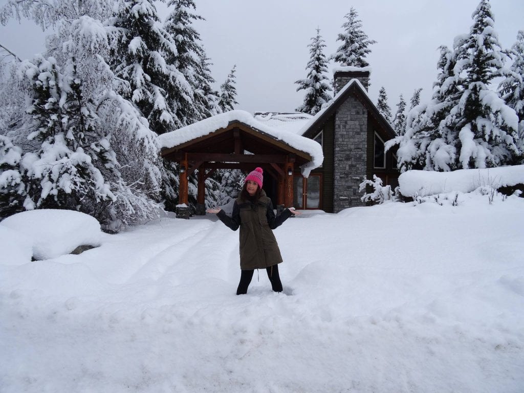 lady in snow at home whistler canada
