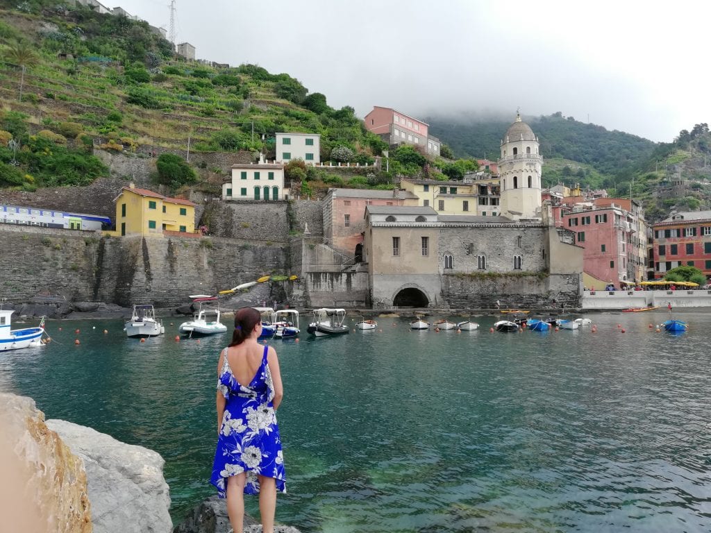 lady in vernazza pier