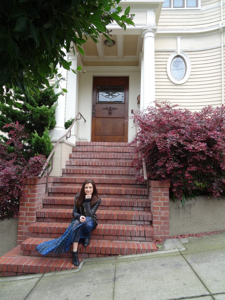 lady on mrs doubtfire house steps