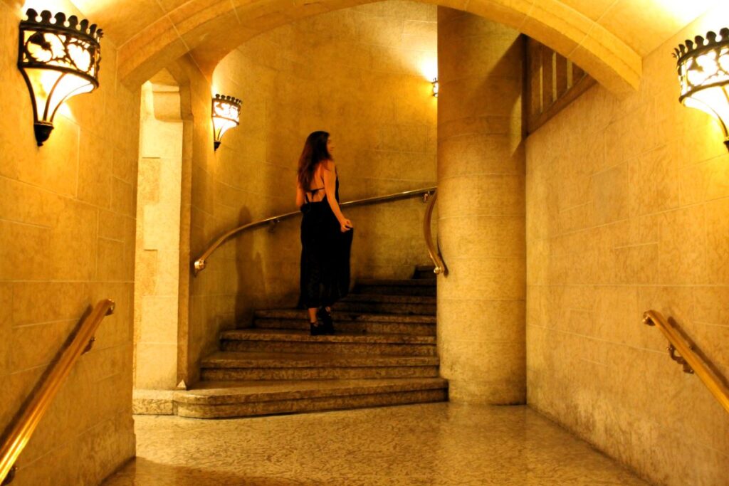 lady in fairmont banff corridor at night