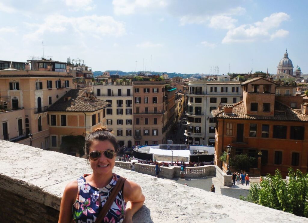 lady at top of spanish steps rome