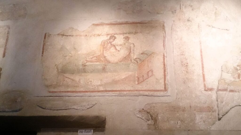 a painting in brothel pompeii