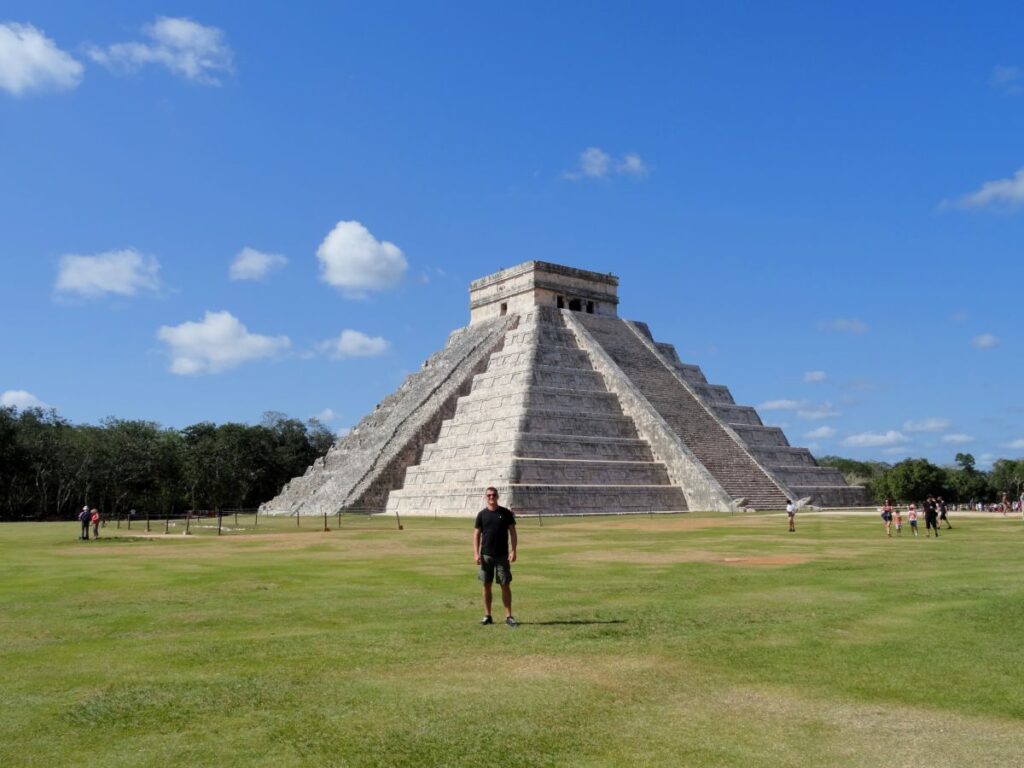 man at el castillo chichen itza