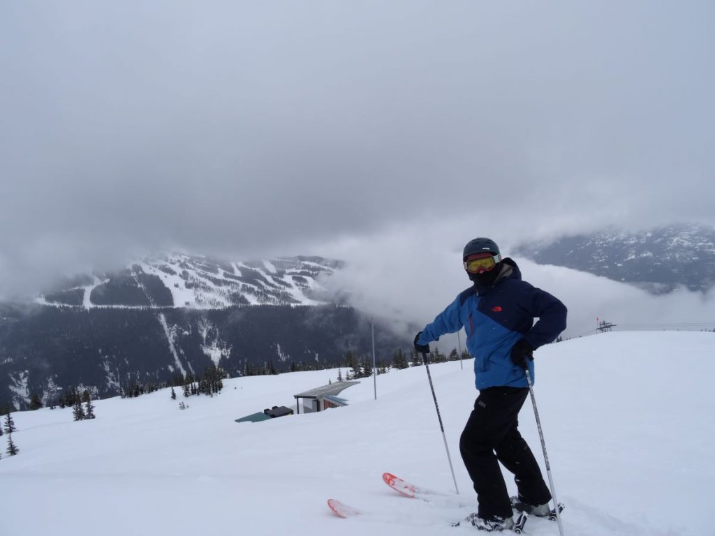 man skiing whistler