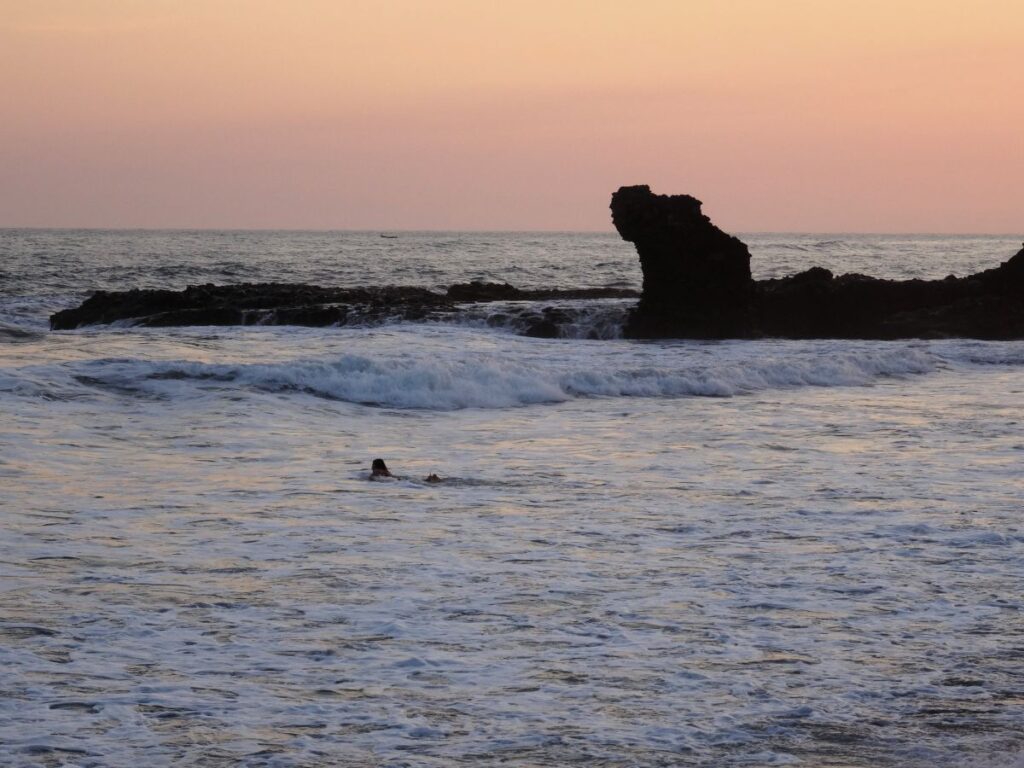 surfer at sunset el tunco