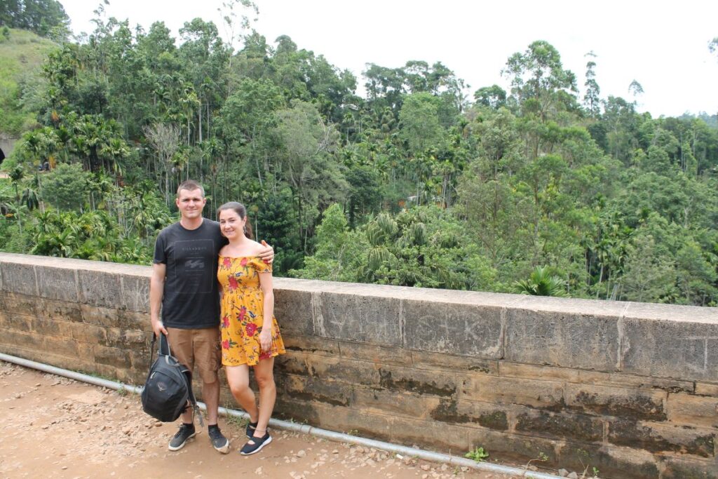 couple at nine arches bridge ella