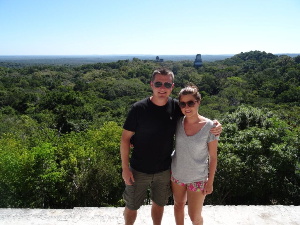 couple poising at tikal guatemala